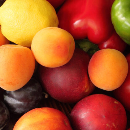 Colorful assorted fruits and vegetables together.