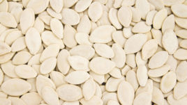Close-up of pumpkin seeds in bulk.
