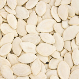 Close-up of pumpkin seeds in bulk.