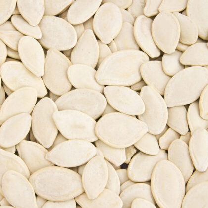 Close-up of pumpkin seeds in bulk.