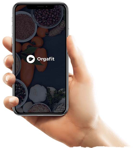 Hand holding smartphone with OrgaFit app.